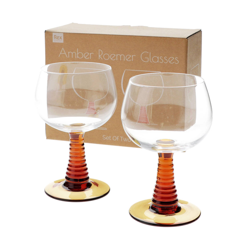 Two amber-roemer glasses with a matching box on a white background