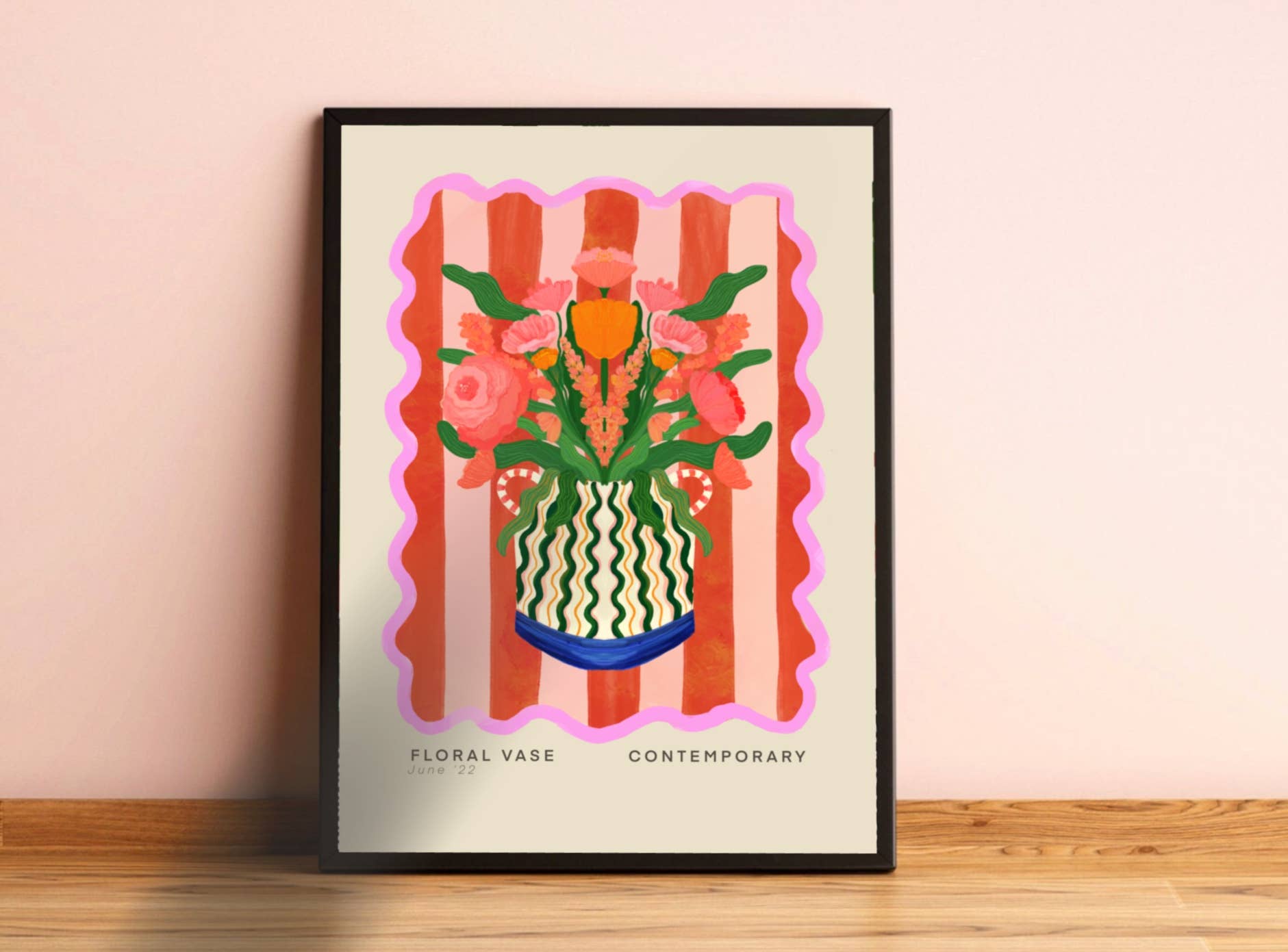 Framed artwork of a floral vase design on a beige wall.
