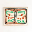 Framed artwork with a butterfly and floral design on a beige background