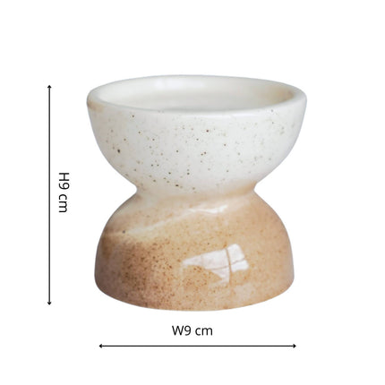 Ceramic candle brown and white holder with measurements on a white background