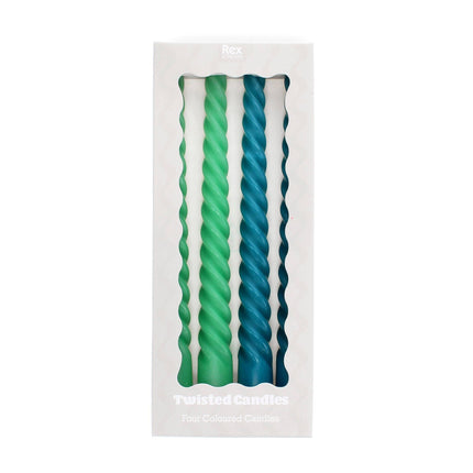 Packaged set of twisted candles in green and blue on a white background