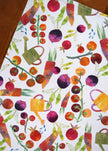 Colorful pattern of vegetables and watering cans on a white background