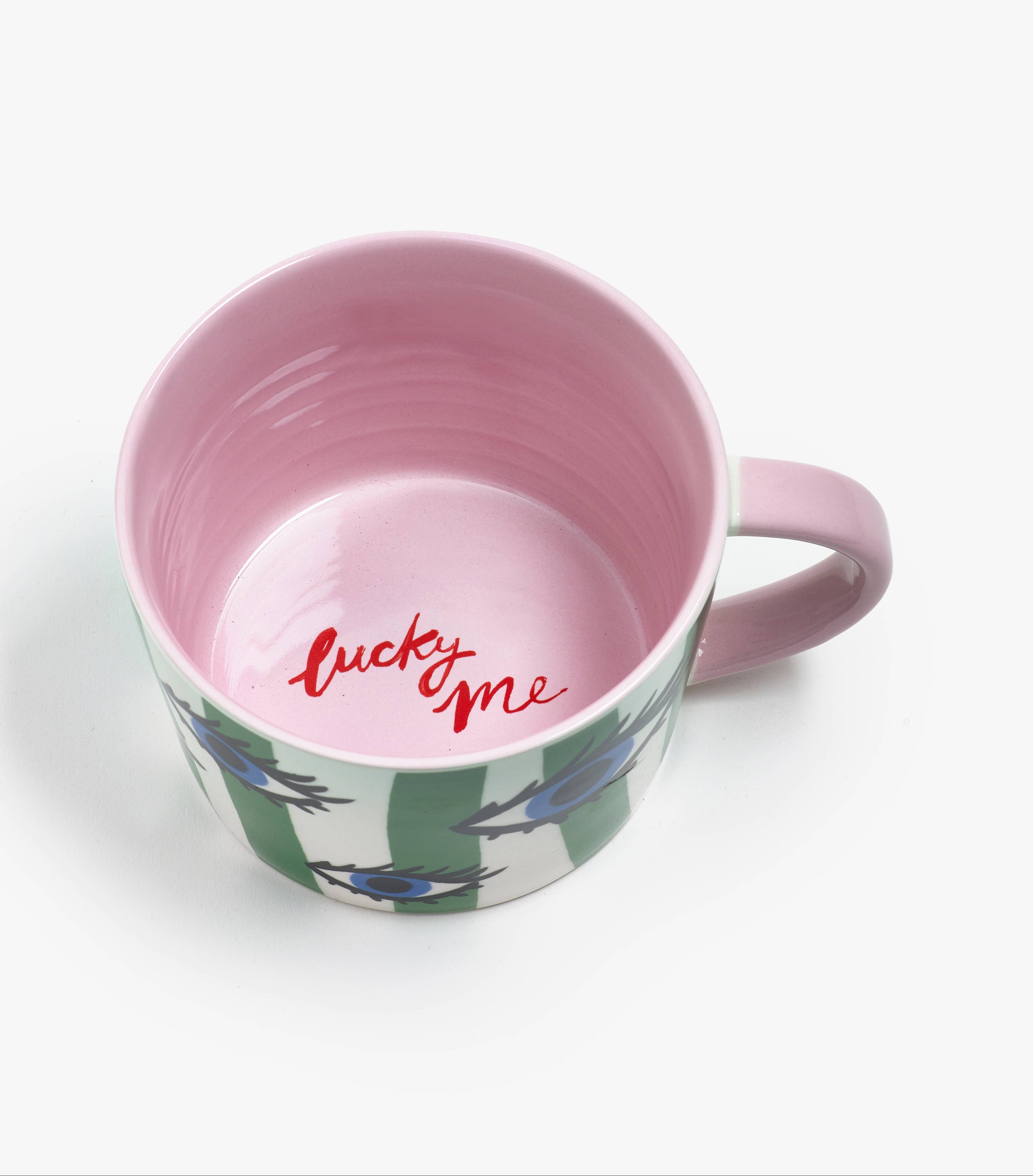 Mug with pink interior and floral exterior on a white background
