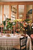 Red, white and blue floral and polka dot table linen with flowers