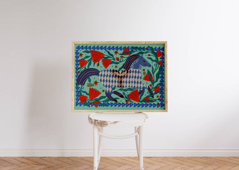 Colourful folksy painting with a horse on a white wall above a white chair.