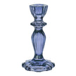 Navy blue glass candle holder on a white background