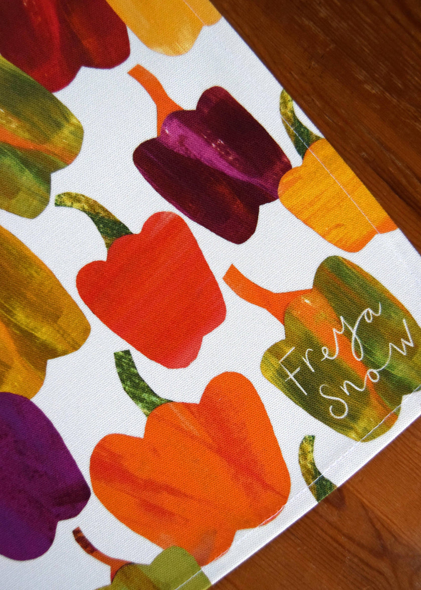 Colorful bell pepper pattern on a white background with 'Freta Snow' branding.